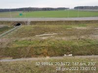 52) 2022-12-28 Stan istniejący - widok na skarpę i przepust pod łącznicami wschodnimi Węzła Żurominek